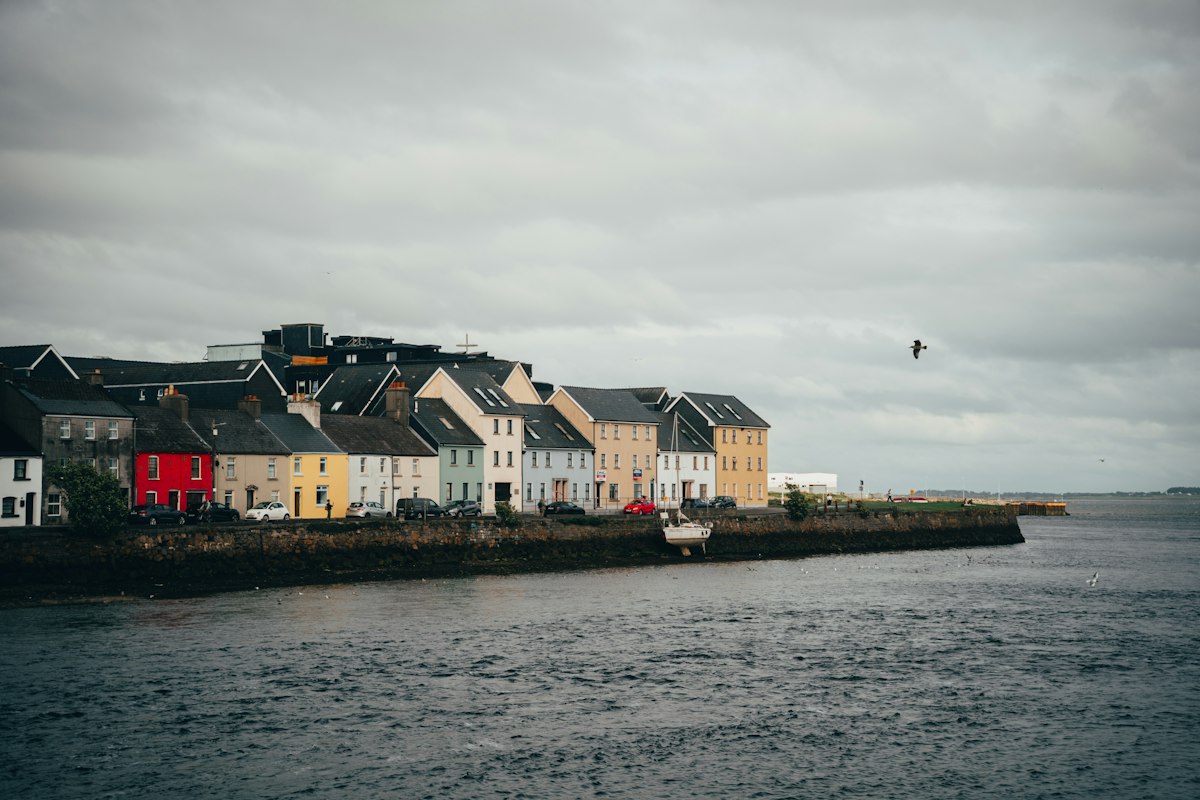 Colourful houses along the Long Walk waterfront in Galway