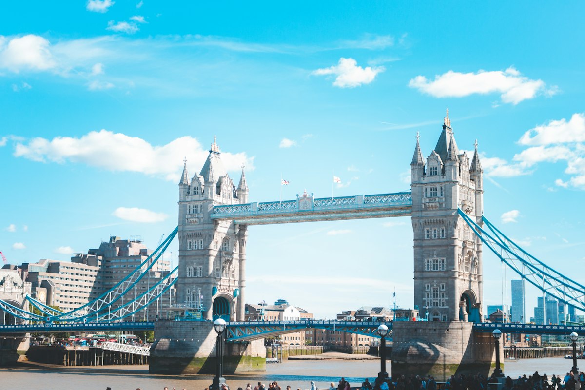 Tower Bridge spanning the Thames under a clear blue sky