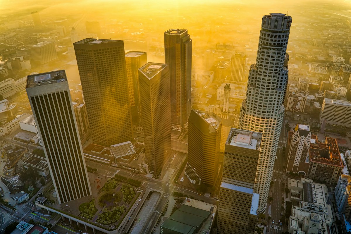 Aerial view of downtown Los Angeles skyscrapers in golden light